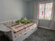 Bedroom with daybed and built-in storage at 2615 Leeshire Ct # 1, Tucker, GA 30084