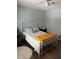 Bedroom with full-size bed and ceiling fan at 2615 Leeshire Ct # 1, Tucker, GA 30084