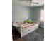 Bedroom featuring a daybed, wood-look flooring, and neutral decor at 2615 Leeshire Ct # 1, Tucker, GA 30084