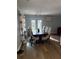 Spacious dining room with a large table and access to the backyard at 2615 Leeshire Ct # 1, Tucker, GA 30084