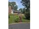 Charming one-story home with a brick chimney, covered porch and a well-manicured front lawn at 2615 Leeshire Ct # 1, Tucker, GA 30084