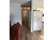 Long hallway with light-colored walls and wood-look flooring at 2615 Leeshire Ct # 1, Tucker, GA 30084