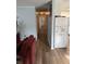 Long hallway with light-colored walls and wood-look flooring at 2615 Leeshire Ct # 1, Tucker, GA 30084