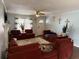 Spacious living room with sectional sofa, large windows, and hardwood floors at 2615 Leeshire Ct # 1, Tucker, GA 30084