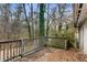 Wooden deck overlooking wooded backyard at 2828 The Meadows Way, Atlanta, GA 30349