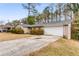 Ranch style home with a long driveway at 2828 The Meadows Way, Atlanta, GA 30349