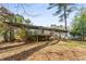 Ranch style home with a deck and large backyard at 2828 The Meadows Way, Atlanta, GA 30349