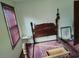 Bedroom with a window, a bed frame, and pink carpet at 804 Bankshire Dr, Suwanee, GA 30024