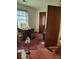 Bedroom with a window, a desk, and pink carpet at 804 Bankshire Dr, Suwanee, GA 30024