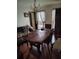 View of dining room featuring a traditional table with chairs and a chandelier at 804 Bankshire Dr, Suwanee, GA 30024