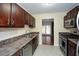 Kitchen with stainless steel appliances and wood cabinets at 1190 Ashborough Se Dr # C, Marietta, GA 30067