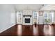 Living room features a stone fireplace and hardwood floors at 30 Graystone Dr, Covington, GA 30014