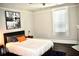 Bedroom with double bed, dark headboard, and wall art at 531 Connally St, Atlanta, GA 30312