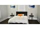 Bedroom with double bed, dark headboard, and side tables at 531 Connally St, Atlanta, GA 30312