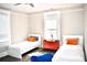 Bedroom with two twin beds, window, and ceiling fan at 531 Connally St, Atlanta, GA 30312