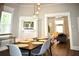 Modern dining room with a view into the living room at 531 Connally St, Atlanta, GA 30312