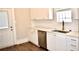 Modern kitchen with white cabinets, stainless steel appliances and back door at 531 Connally St, Atlanta, GA 30312