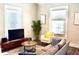 Comfortable living room featuring modern furniture, large windows, and decorative accents at 531 Connally St, Atlanta, GA 30312