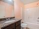 Bathroom with tub and granite countertop vanity at 4361 River Vista Rd, Ellenwood, GA 30294