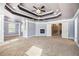 Large bedroom with fireplace and access to hallway at 4361 River Vista Rd, Ellenwood, GA 30294