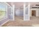 Bedroom with high ceilings and two large windows at 4361 River Vista Rd, Ellenwood, GA 30294