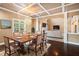 Open concept dining area with hardwood floors and chandelier at 4361 River Vista Rd, Ellenwood, GA 30294