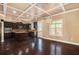 Kitchen with dark wood cabinets, granite counters, and island at 4361 River Vista Rd, Ellenwood, GA 30294