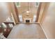 Two-story living room with fireplace and hardwood floors at 4361 River Vista Rd, Ellenwood, GA 30294