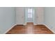 Spacious bedroom with hardwood floors and ample closet space at 615 Brookwater Dr, Stockbridge, GA 30281