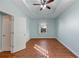 Spacious bedroom with hardwood floors and a ceiling fan at 615 Brookwater Dr, Stockbridge, GA 30281