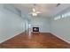 Bright living room with hardwood floors and a fireplace at 615 Brookwater Dr, Stockbridge, GA 30281