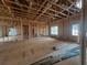 Living room with large windows and doors leading outside at 85 Presley Farm Parkway, Rockmart, GA 30153