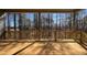 Wide back porch overlooks a forest landscape at 85 Presley Farm Pkwy, Rockmart, GA 30153