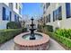 Charming courtyard with a beautiful fountain and landscaping at 3959 Saint Elisabeth Sq, Duluth, GA 30096