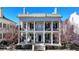 Grand two-story home with classic columns and a balcony at 3959 Saint Elisabeth Sq, Duluth, GA 30096