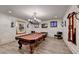 Basement game room featuring a classic pool table at 3959 Saint Elisabeth Sq, Duluth, GA 30096