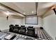 Home theater with reclining black leather seats and large screen at 3959 Saint Elisabeth Sq, Duluth, GA 30096