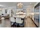 Modern kitchen with large island and stainless steel appliances at 3959 Saint Elisabeth Sq, Duluth, GA 30096