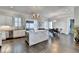 Large kitchen with marble island, hardwood floors and stainless steel appliances at 3959 Saint Elisabeth Sq, Duluth, GA 30096