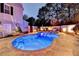 Night view of a relaxing pool and spa at 3959 Saint Elisabeth Sq, Duluth, GA 30096