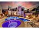 Stunning pool and hot tub at night, beautifully illuminated at 3959 Saint Elisabeth Sq, Duluth, GA 30096