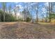 Large backyard with shed, offering ample outdoor space at 5915 Burruss Mill Rd, Cumming, GA 30041