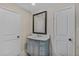 Updated vanity and new flooring in a neutrally decorated bathroom at 1256 Elizabeth Ave, Atlanta, GA 30310