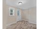 Neutral interior with light wood flooring and a back door at 1256 Elizabeth Ave, Atlanta, GA 30310