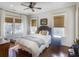 Bright bedroom with hardwood floors, large windows, and ceiling fan at 2583 Habersham Nw Rd, Atlanta, GA 30305