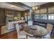 Charming dining area with a round wooden table and built-in bench seating at 2583 Habersham Nw Rd, Atlanta, GA 30305