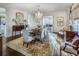 Formal dining room with a large table, chandelier, and hardwood floors at 2583 Habersham Nw Rd, Atlanta, GA 30305