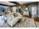 Living room with white sofa, decorative pillows, and access to a dining area at 2583 Habersham Nw Rd, Atlanta, GA 30305