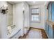 Charming sitting area with window seat, built-in shelving, and blue cabinet at 2583 Habersham Nw Rd, Atlanta, GA 30305