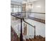 Elegant staircase with a double-height landing and hardwood floors at 2583 Habersham Nw Rd, Atlanta, GA 30305